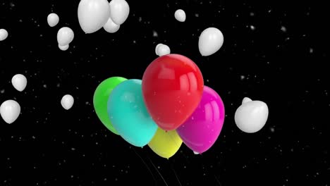 animación de globos coloridos volando y confeti cayendo sobre un fondo negro