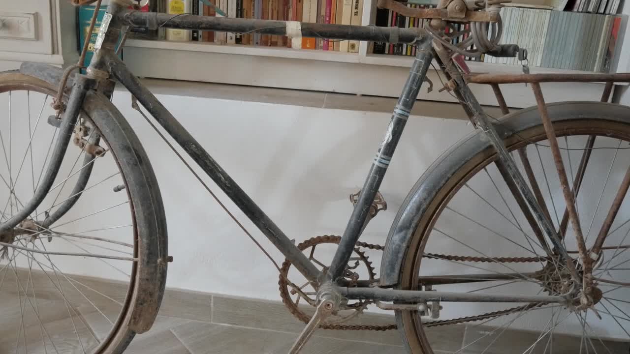 Vintage bicycle displayed indoors reflecting nostalgia and history