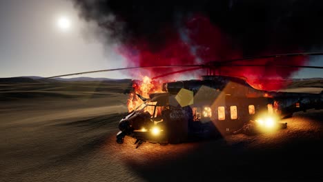 burned military helicopter in the desert at sunset