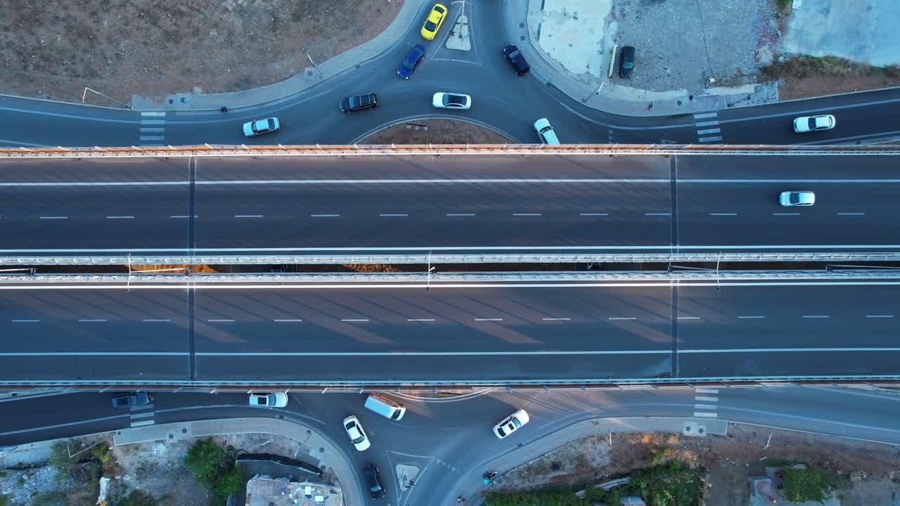 Top-down aerial Tirana highway ring road, flowing cars in different directions on a daily commuting life