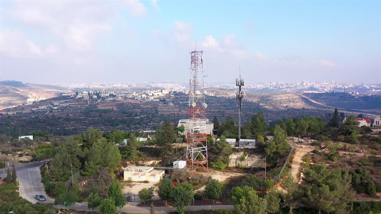 Aerial View of Telecommunication Towers in Mountainous Area