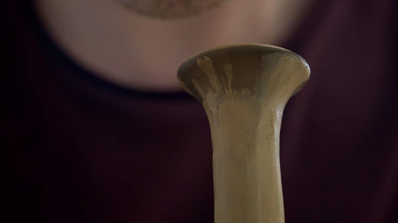 Close-up of Hands Shaping a Clay Vase