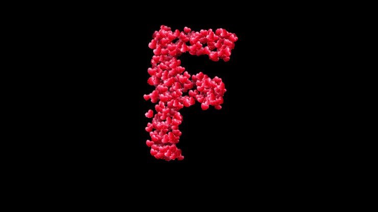 Animazione della lettera F con particelle a forma di cuore su sfondo trasparente