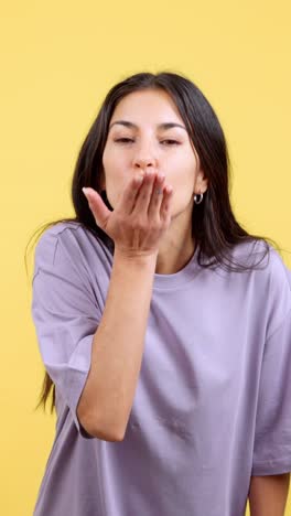 woman blowing a kiss