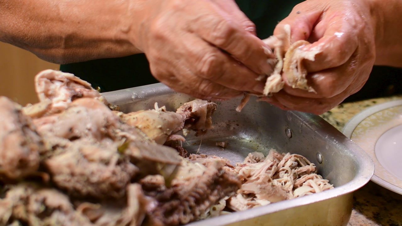 Woman Hands Separating Cooked Chicken Meat Close Up Food Preparation