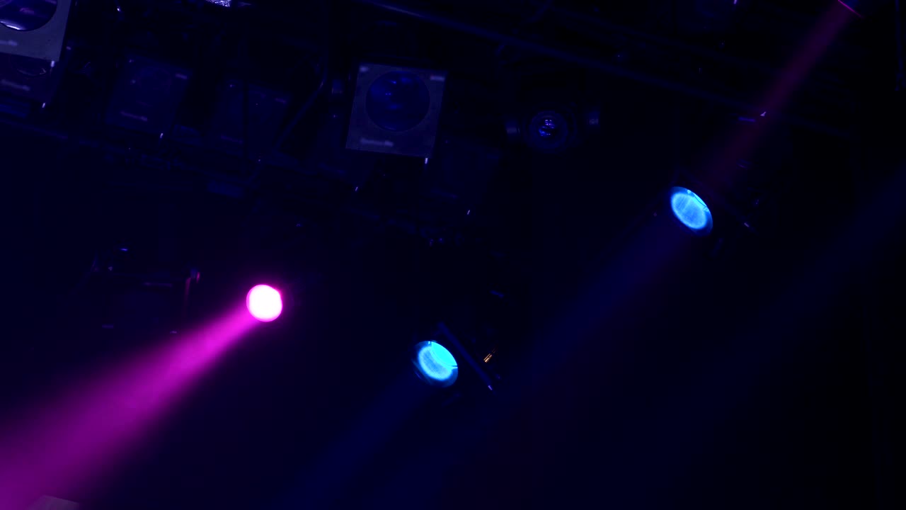 The spotlight through the smoke on stage. Lighting equipment. Effect Lights. Scanner. Color Changers. Moving Yoke. Moving Head