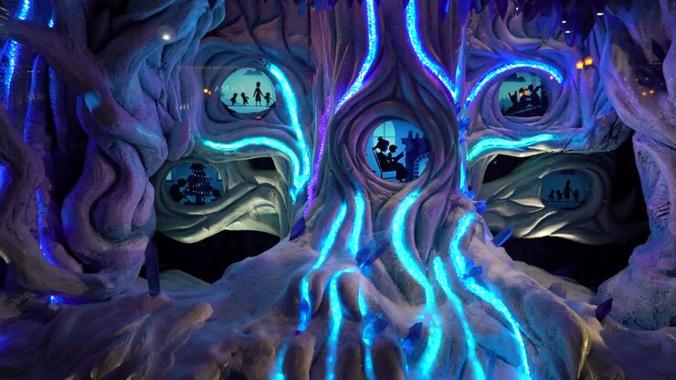 Maltiple Christmas abstract stories made with blue light and silhouette shape on a showcase