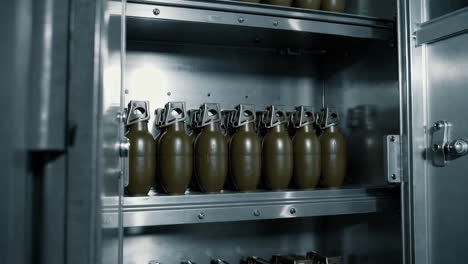 military grenades stored in a metal cabinet