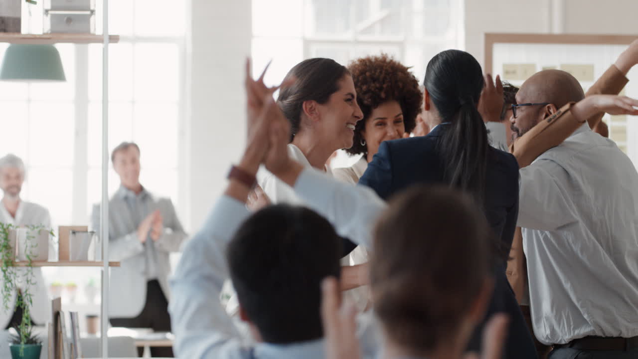 happy business people celebrating successful corporate victory colleagues high five in office meeting enjoying winning success
