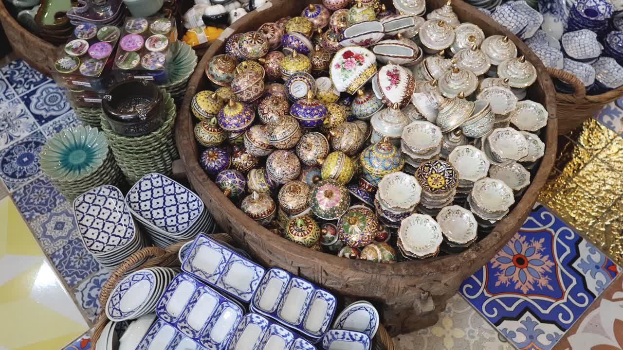 Arranging and choosing various handmade crafts