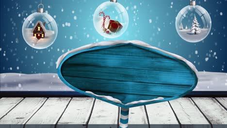 Animation-of-road-sign-with-copy-space-over-snow-falling-and-baubles-on-blue-background