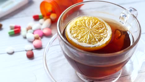 tea with lemon and medicine