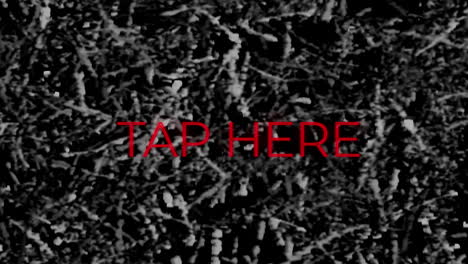 animation of red neon text, tap here, on monochrome grass background