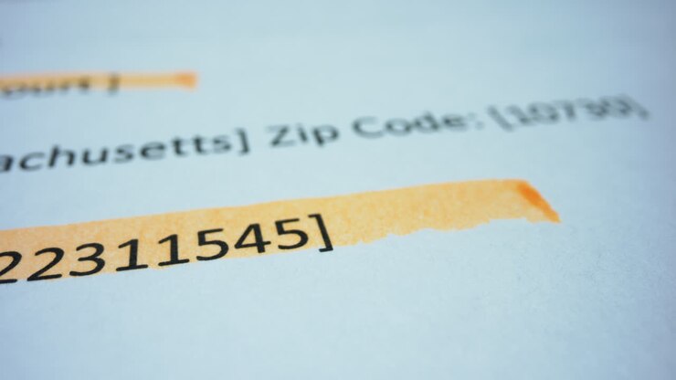 Maker drawing straight line on business paper. Person editing printed document