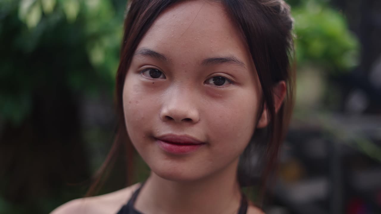 Close-up Portrait of a Smiling Teenage Girl