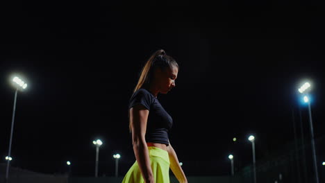 tennis player at night