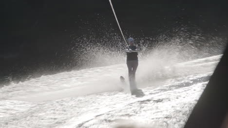 woman waterskiing on a lake