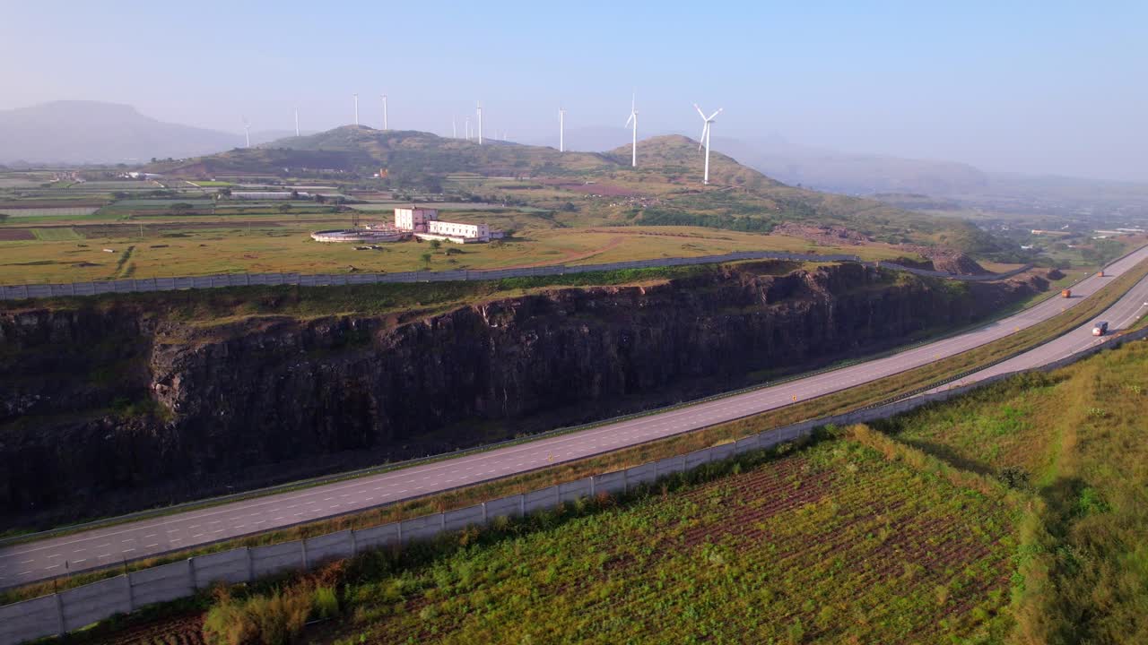 Mumbai Nagpur Expressway with wind mills, green corridor, Maharashtra, Drone shot