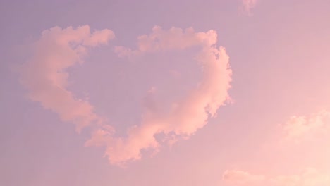 heart-shaped clouds in a pink sky