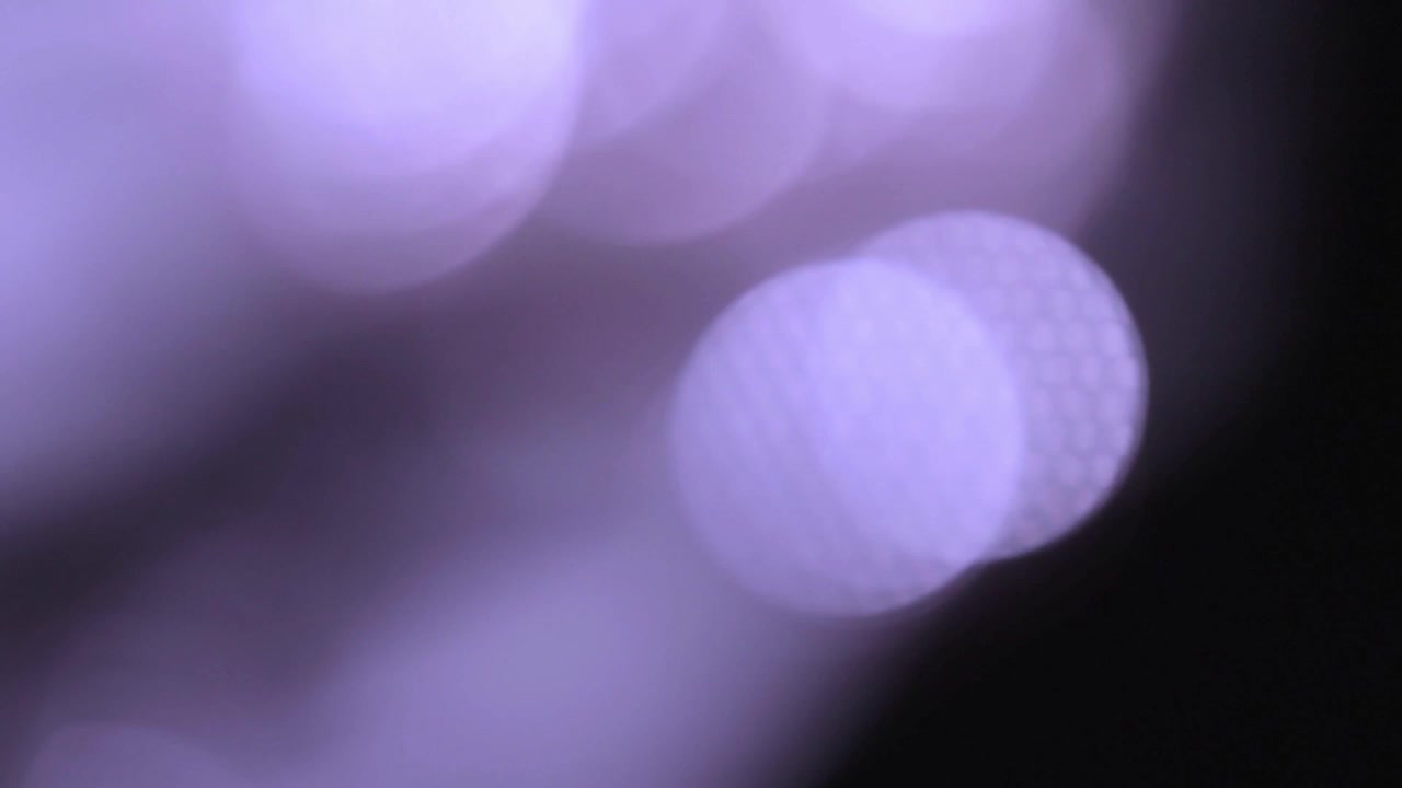 Riassunto sfondo Bokeh di luce viola