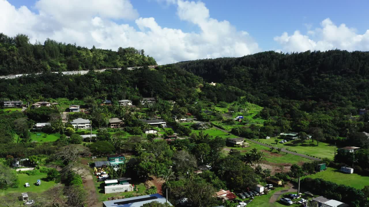 Aerial View of Lush Tropical Valley with Houses