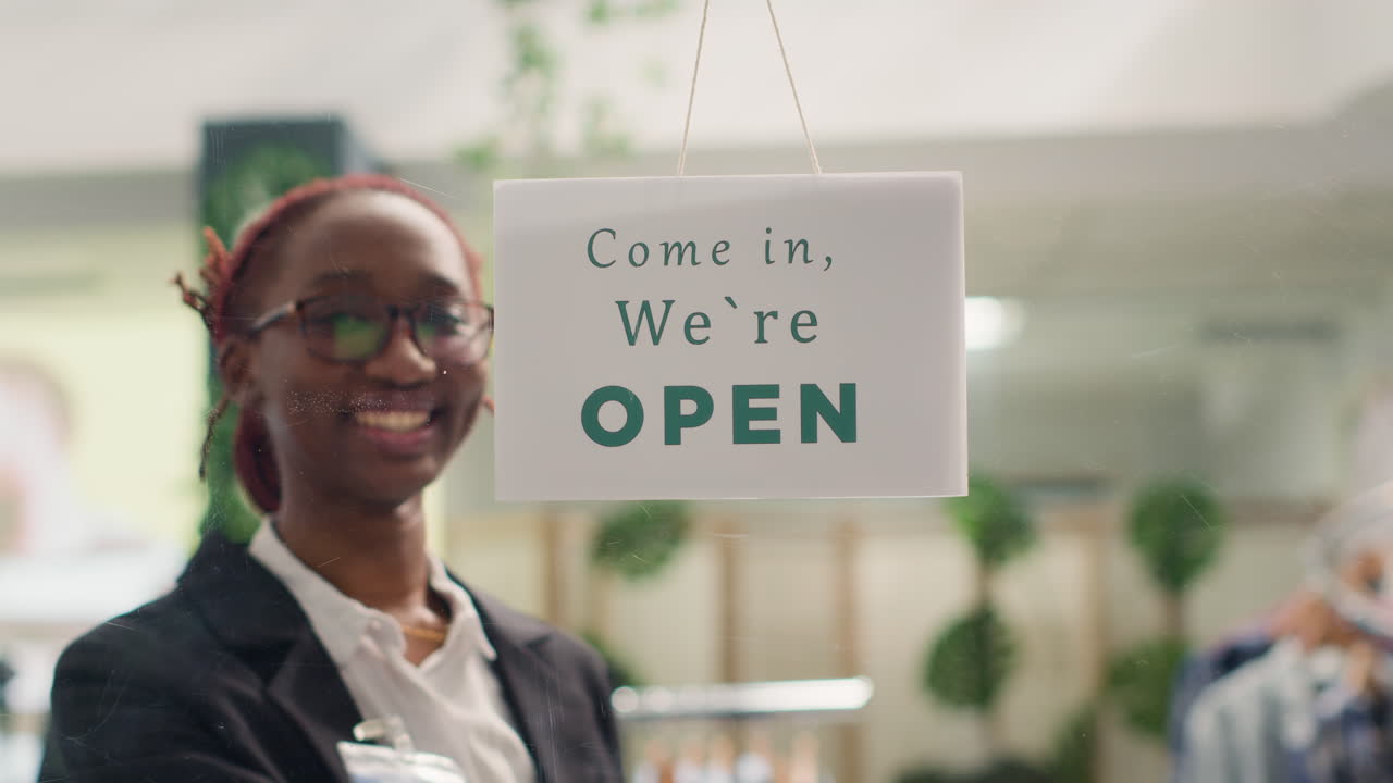 Worker opens clothing store