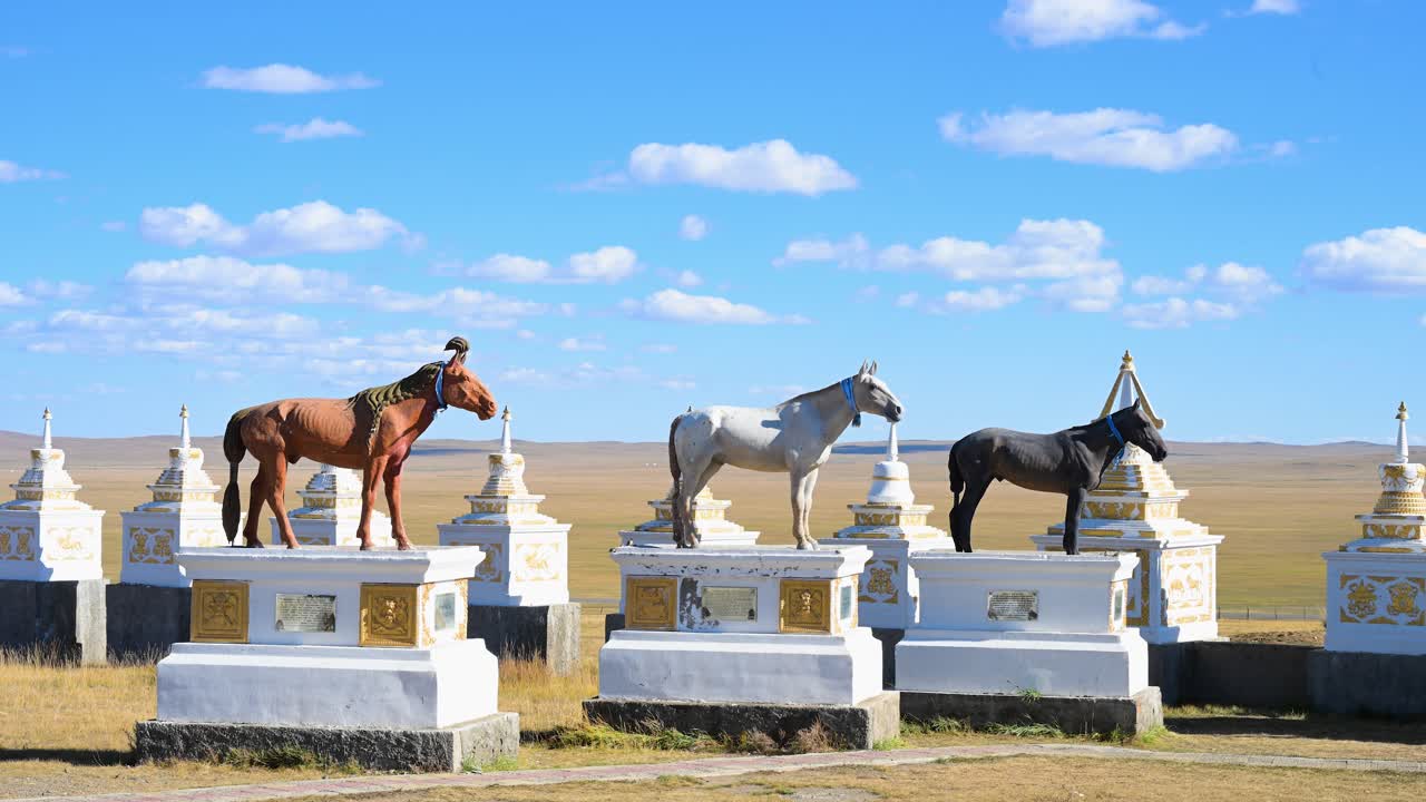 A memorial complex in Mongolia honors the legacy of champion horses with ornate statues. Set against the vast steppe, this site is a testament to the nation's profound equestrian heritage