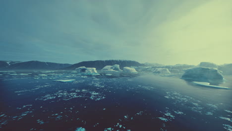 gigantic ice block structures on the black sand by the sea shore