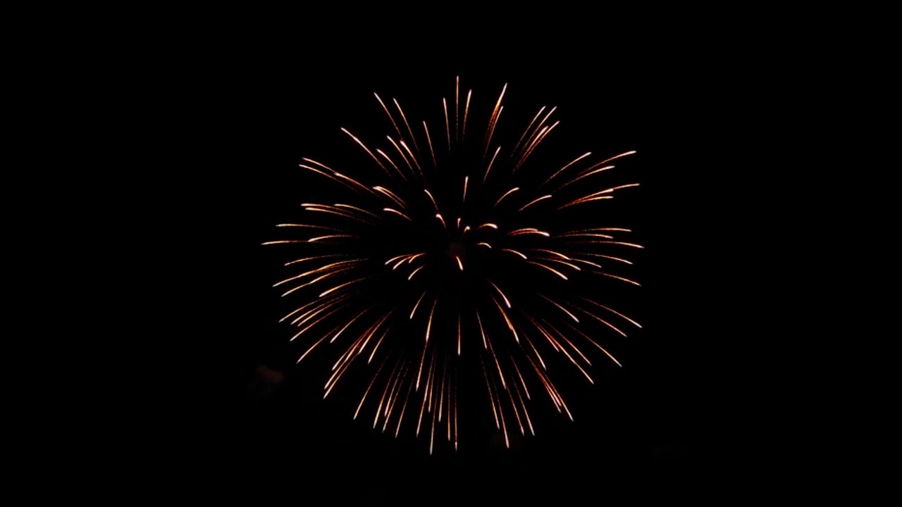Golden big shiny fireworks bokeh lights in the night sky alpha green screen animation firework show