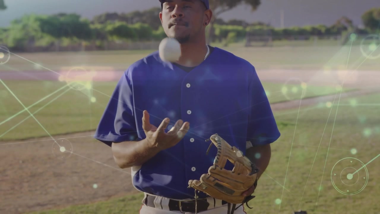 Baseball player on field initiating toss for fielding drill while tech overlay showing trajectory