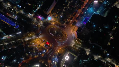 night illuminated nanjing city center traffic street circle tower aerial topdown panorama 4k china