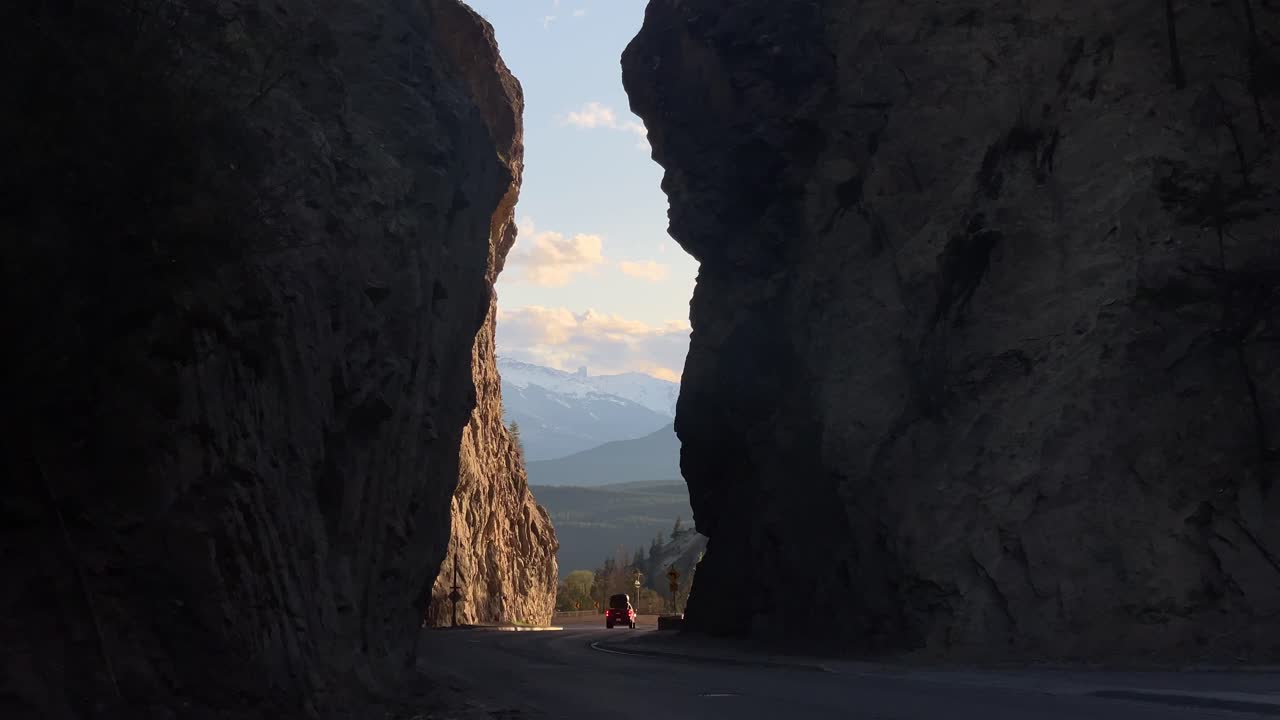Truck in the mountains passing trough a gorge