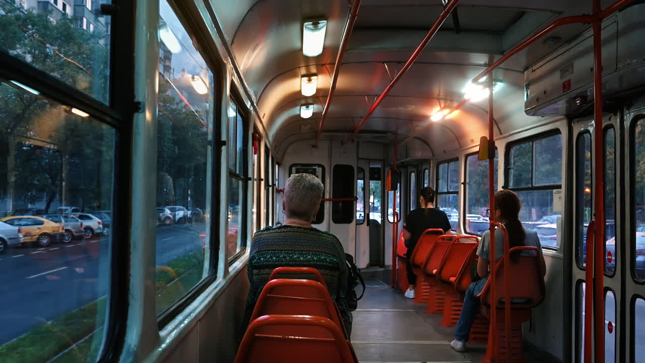 People riding the tram in the evening in Bucharest, Romania