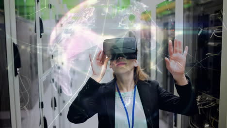 using virtual reality headset, woman exploring digital globe animation over data center