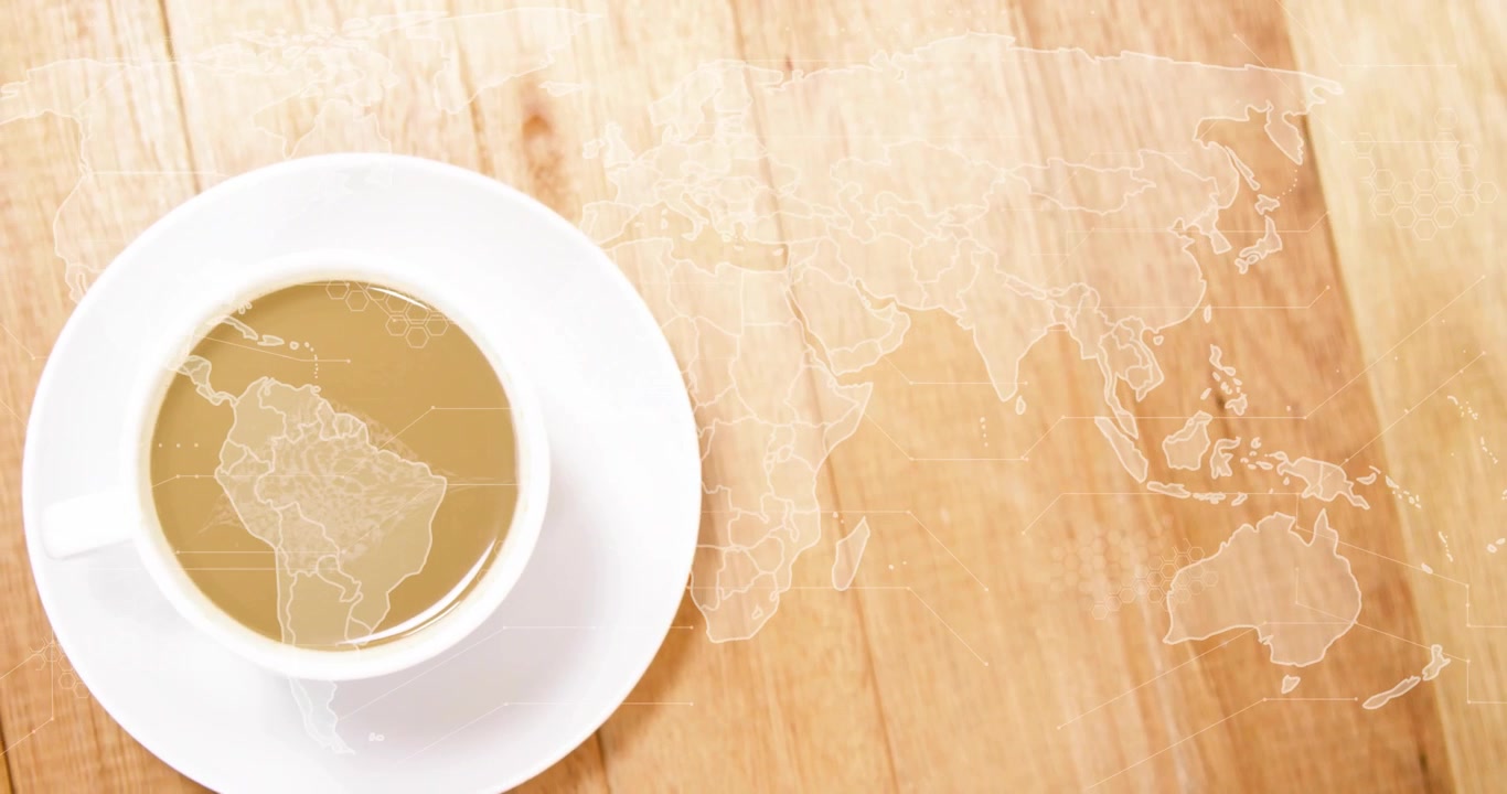 All'avvio, una tazza di caffè si sposta in alto a sinistra, una mappa del mondo emerge intensificandosi mentre la tazza scorre al centro.