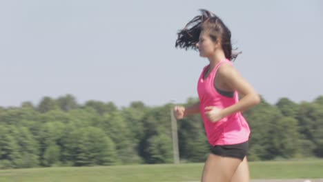 woman running by the lake