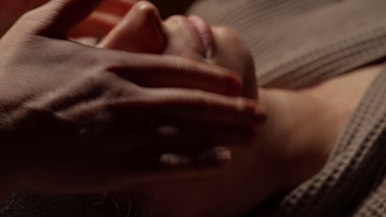 Close-up of Woman Receiving Relaxing Facial Massage