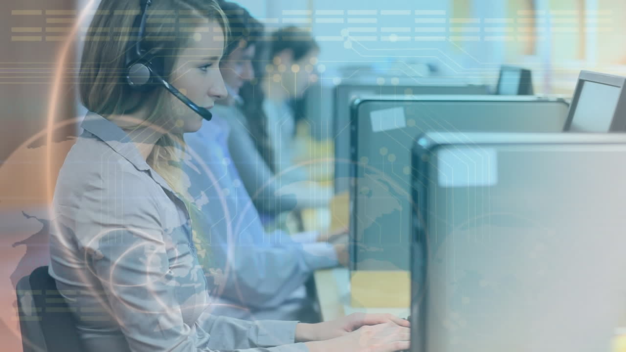 Team of call centre agents in their workstations