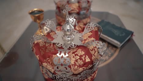 close up of wedding crowns and bible orthodox church in serbia