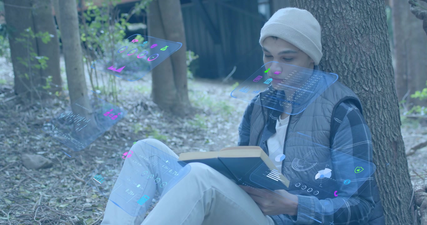 Tech student sitting studying book projecting hologram panel on hearing sound and fading interface