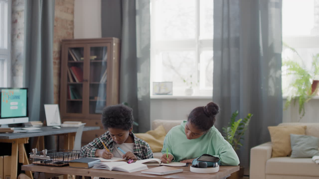 Afro Kids Doing Homework Together