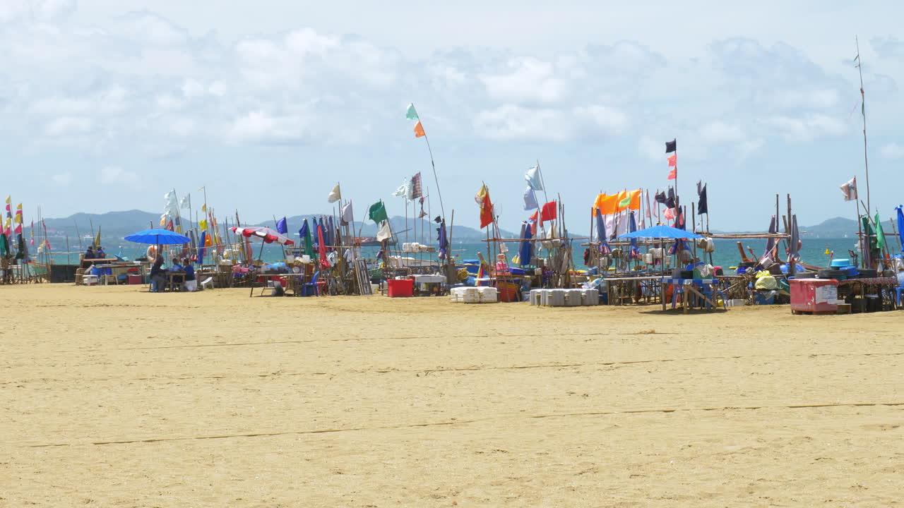 Local hawkers preparing their food stalls to sell street food from afternoon to midnight at the beachfront of Pattaya in Chonburi province in Thailand