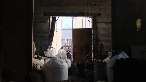 industrial warehouse interior with worker