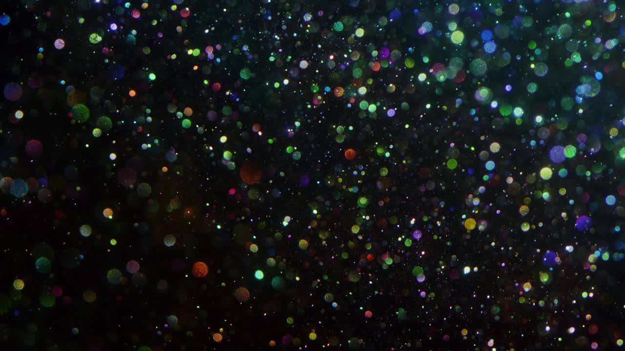 Abstract background with shining bokeh sparkles.