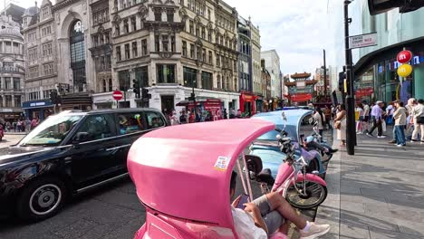 vibrant city scene with pedestrians and vehicles