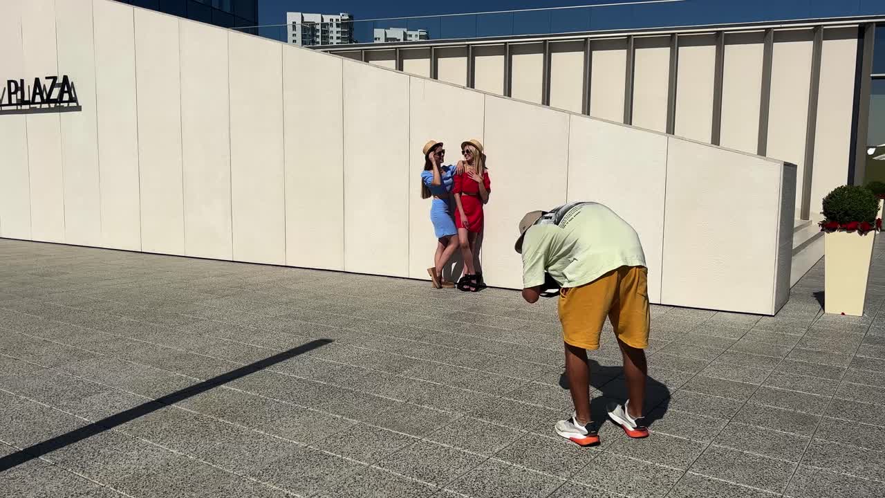 Fashionable women posing in urban setting