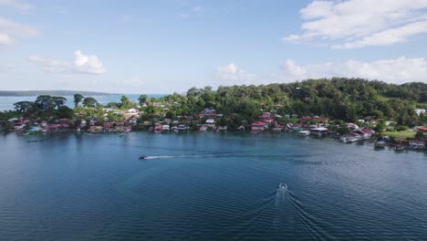aerial view of a tropical coastal village