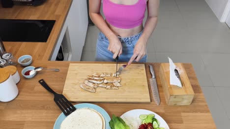 preparing a chicken tortilla wrap