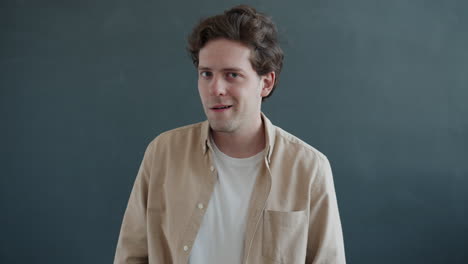 man in beige shirt