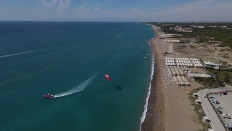 Parasiling-Drawn-By-The-Boat-Beach